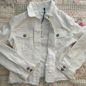 Eunina brand star embroidered jacket with frayed bottom.